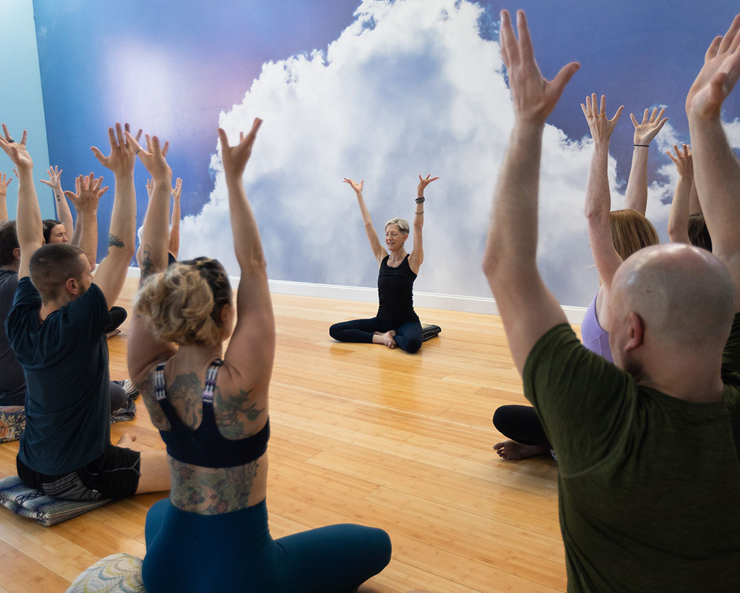 ayc_sale2 Asheville Yoga Center classroom with yoga students and teacher